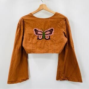 Earthbound orange butterfly cropped flare button top